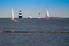 Boats Surrounding Peck's Ledge Light in Connecticut